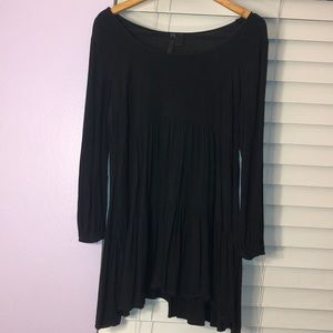 Black dress with pleated skirt